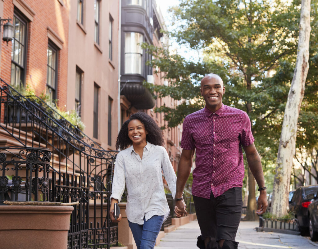 Image of black couple walking on street in Manhattan couples therapy