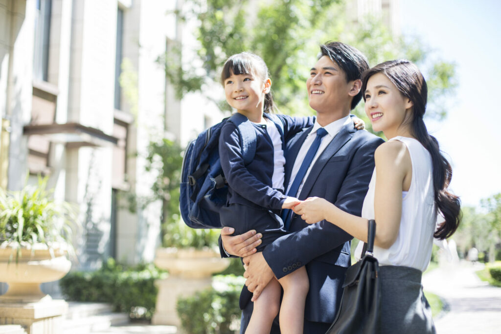 Image of Asian parents in NYC scoring their attachment styles